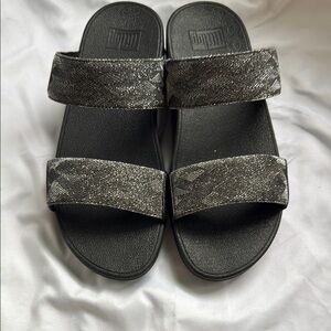 FitFlop Lulu Glitz Slides, size 8 in black. BRAND NEW NEVER WORN!